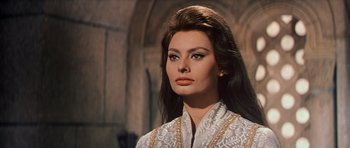 Movie still from “El Cid” (1961), directed by Anthony Mann – A person with long hair; Close Up shot, Low angle