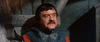 Movie still from “El Cid” (1961), directed by Anthony Mann – A person with a beard and mustache; Close Up shot, High angle