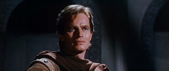 Movie still from “El Cid” (1961), directed by Anthony Mann – A person wearing a robe; Close Up shot, Low angle