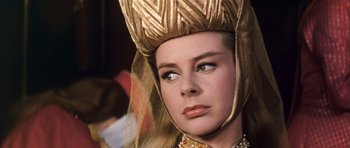 Movie still from “El Cid” (1961), directed by Anthony Mann – A person wearing a headdress; Close Up shot, Over the shoulder angle