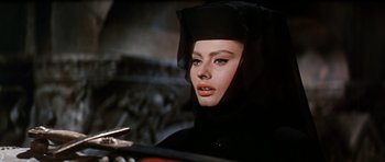 Movie still from “El Cid” (1961), directed by Anthony Mann – A person wearing a headscarf; Close Up shot, Low angle