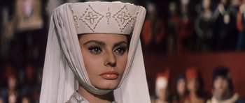 Movie still from “El Cid” (1961), directed by Anthony Mann – A person wearing a headpiece; Close Up shot, Low angle