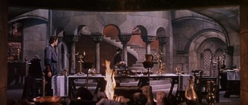 Movie still from “El Cid” (1961), directed by Anthony Mann – A scene of a stage with a fire in the middle of the stage; Extreme Wide shot, High angle