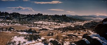 Movie still from “El Cid” (1961), directed by Anthony Mann – A snowy landscape with a mountain in the background; Extreme Wide shot, High angle