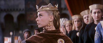 Movie still from “El Cid” (1961), directed by Anthony Mann – A person wearing a crown; Close Up shot, Low angle