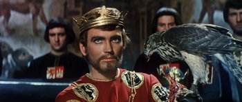 Movie still from “El Cid” (1961), directed by Anthony Mann – A person wearing a crown; Close Up shot, Low angle