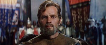 Movie still from “El Cid” (1961), directed by Anthony Mann – A person with a beard; Close Up shot, Low angle