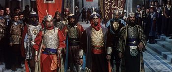 Movie still from “El Cid” (1961), directed by Anthony Mann – A group of men dressed in medieval costumes; Wide shot, High angle