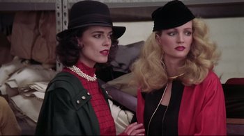 Movie still from “El Norte” (1983), directed by Gregory Nava – A couple of women standing next to each other; Medium shot, Over the shoulder angle