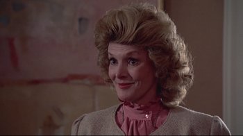 Movie still from “El Norte” (1983), directed by Gregory Nava – A person wearing a pink shirt; Close Up shot, Low angle