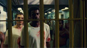 Movie still from “Elite Squad 2: The Enemy Within” (2010), directed by José Padilha – A group of men standing next to each other in a room; Medium shot, High angle