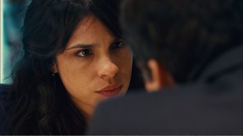 Movie still from “Elite Squad 2: The Enemy Within” (2010), directed by José Padilha – A person looking at the camera; Close Up shot, Over the shoulder angle