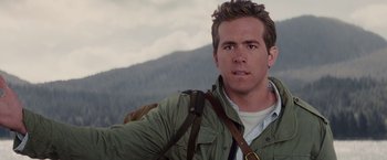 Movie still from “The Proposal” (2009), directed by Anne Fletcher – A person wearing a jacket; Close Up shot, Over the shoulder angle