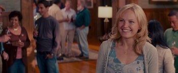 Movie still from “The Proposal” (2009), directed by Anne Fletcher – A group of people standing in a room; Medium shot, Over the shoulder angle