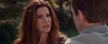 Movie still from “The Proposal” (2009), directed by Anne Fletcher – A person talking to another person; Close Up shot, Over the shoulder angle