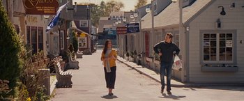 Movie still from “The Proposal” (2009), directed by Anne Fletcher – A woman and a man walking down a street; Wide shot, Over the shoulder angle