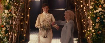Movie still from “The Proposal” (2009), directed by Anne Fletcher – An older woman and a younger woman holding hands; Medium shot, Over the shoulder angle
