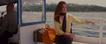Movie still from “The Proposal” (2009), directed by Anne Fletcher – A woman sitting on the back of a boat; Medium shot, Over the shoulder angle