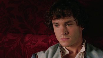 Movie still from “Ella Enchanted” (2004), directed by Tommy O'Haver – A person wearing a robe; Close Up shot, High angle