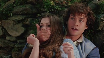 Movie still from “Ella Enchanted” (2004), directed by Tommy O'Haver – A man and a woman covering their mouth; Close Up shot, Low angle