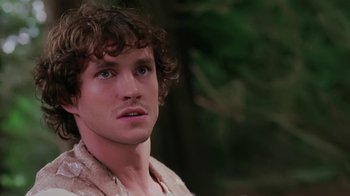 Movie still from “Ella Enchanted” (2004), directed by Tommy O'Haver – A person with curly hair; Close Up shot, Over the shoulder angle