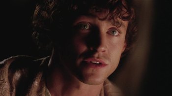 Movie still from “Ella Enchanted” (2004), directed by Tommy O'Haver – A person wearing a shirt; Close Up shot, Over the shoulder angle