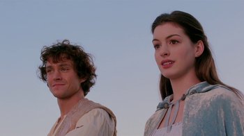 Movie still from “Ella Enchanted” (2004), directed by Tommy O'Haver – A man and a woman standing next to each other; Close Up shot, Low angle