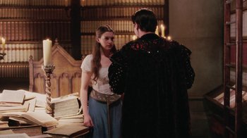 Movie still from “Ella Enchanted” (2004), directed by Tommy O'Haver – A man and a woman standing next to each other; Medium shot, Over the shoulder angle