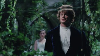 Movie still from “Ella Enchanted” (2004), directed by Tommy O'Haver – A man and a woman standing in a forest; Medium shot, Over the shoulder angle