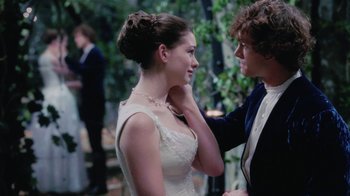 Movie still from “Ella Enchanted” (2004), directed by Tommy O'Haver – A man and a woman in wedding attire; Medium shot, Over the shoulder angle