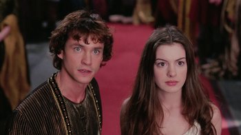 Movie still from “Ella Enchanted” (2004), directed by Tommy O'Haver – A man and a woman standing next to each other; Close Up shot, Low angle