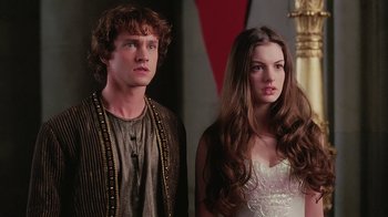 Movie still from “Ella Enchanted” (2004), directed by Tommy O'Haver – A man and a woman standing next to each other; Close Up shot, Over the shoulder angle