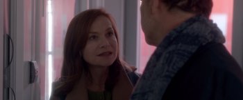 Movie still from “Elle” (2016), directed by Paul Verhoeven – A woman and a man are talking to each other; Close Up shot, Over the shoulder angle