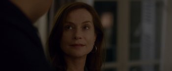 Movie still from “Elle” (2016), directed by Paul Verhoeven – A person looking up at the sky; Close Up shot, Over the shoulder angle