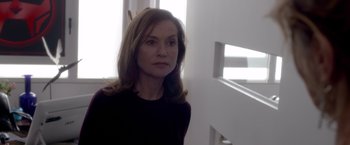 Movie still from “Elle” (2016), directed by Paul Verhoeven – A person with long hair; Close Up shot, Low angle