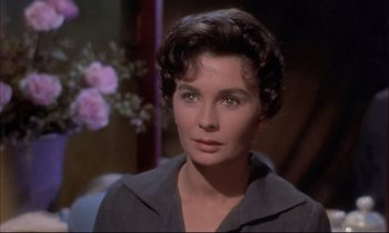 Movie still from “Elmer Gantry” (1960), directed by Richard Brooks – A person with short hair; Close Up shot, Over the shoulder angle