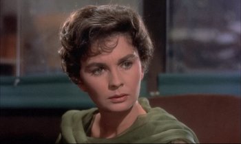 Movie still from “Elmer Gantry” (1960), directed by Richard Brooks – A person with short hair; Close Up shot, Over the shoulder angle