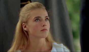 A beautiful young lady with blue eyes and blonde hair
