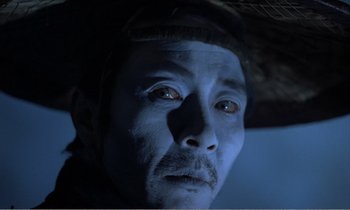 Movie still from “Empire of Passion” (1978), directed by Nagisa Ôshima – A person with a hat on; Close Up shot, High angle