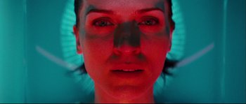 Movie still from “Empire of the Wolves” (2005), directed by Chris Nahon – A person's face in a swimming pool; Extreme Close Up shot, Overhead angle