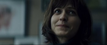 Movie still from “Empire of the Wolves” (2005), directed by Chris Nahon – A person looking up at the sky; Close Up shot, Over the shoulder angle