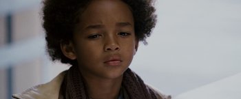 Movie still from “The Pursuit of Happyness” (2006), created by Frank Darabont – A young boy's face; Close Up shot, Low angle