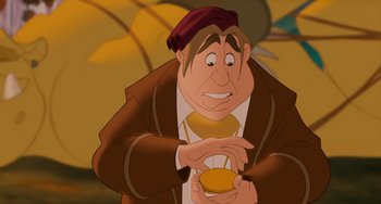 Movie still from “Enchanted” (2007), directed by Kevin Lima – An animated picture of a man holding a bowl; Close Up shot, High angle