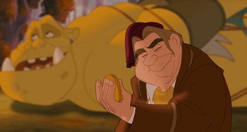 Movie still from “Enchanted” (2007), directed by Kevin Lima – A man holding a piece of food in his hands; Medium shot, Over the shoulder angle