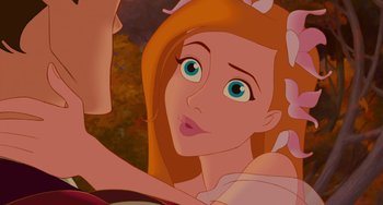 Movie still from “Enchanted” (2007), directed by Kevin Lima – A woman's face in a painting; Close Up shot, Over the shoulder angle