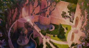 Movie still from “Enchanted” (2007), directed by Kevin Lima – An aerial view of a park with trees and a bridge; Extreme Wide shot, Overhead angle