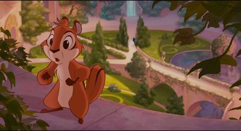 Movie still from “Enchanted” (2007), directed by Kevin Lima – A squirrel standing on the ledge of a building; Wide shot, High angle