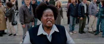 Movie still from “Enchanted” (2007), directed by Kevin Lima – A woman with an angry look on her face; Medium shot, High angle