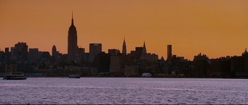 Movie still from “Enchanted” (2007), directed by Kevin Lima – A view of the skyline of new york at sunset; Extreme Wide shot, Low angle