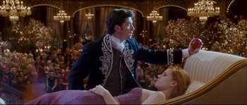 Movie still from “Enchanted” (2007), directed by Kevin Lima – A man and a woman in formal clothing in a ballroom; Medium shot, Low angle